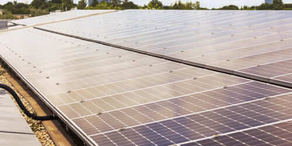 solar-panel-system-rooftop-house-apartment-building-solar-panels-house-roof-highrise-buildings (1)