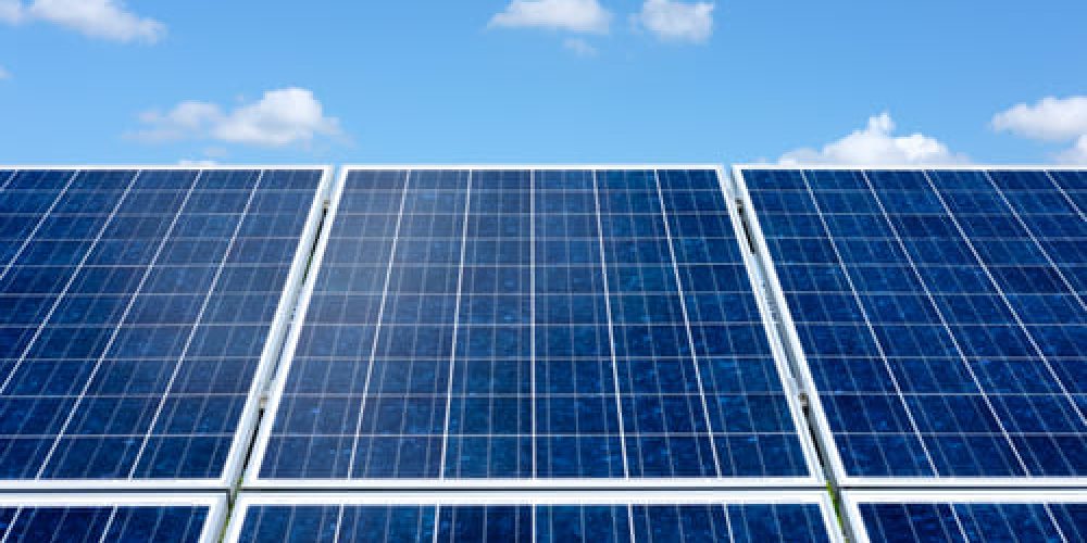 solar-pannels-with-blue-sky-background